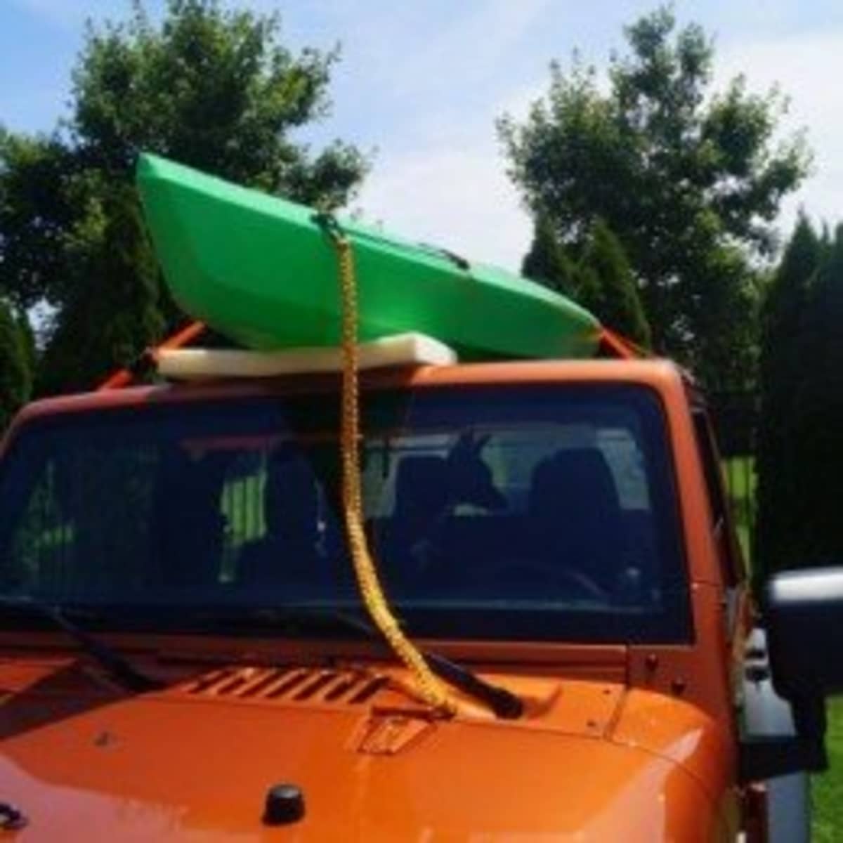 How to Strap a Kayak to a Soft Top Jeep for Transport - SkyAboveUs
