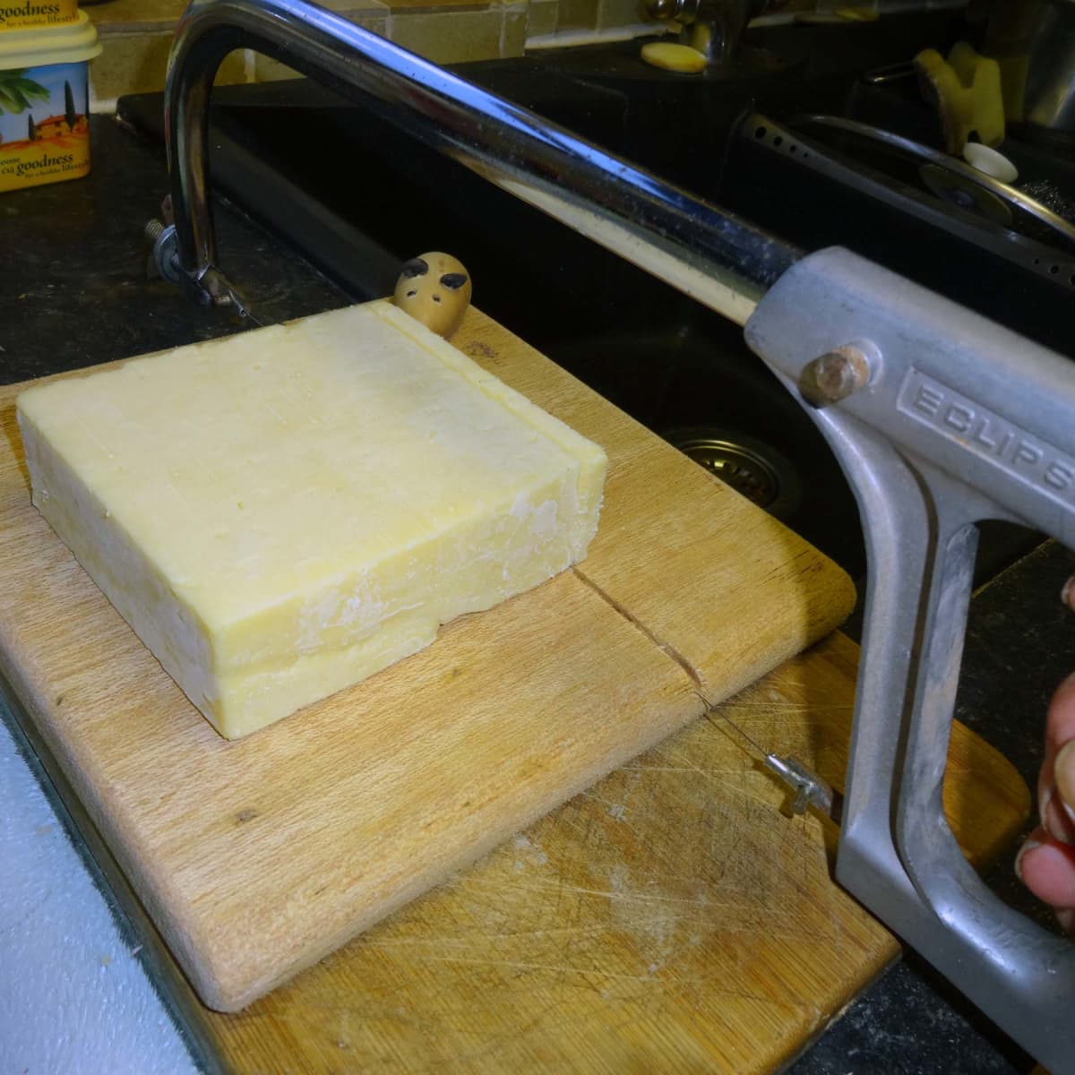 Block Cheese Cutting on the Wire Cutter B 