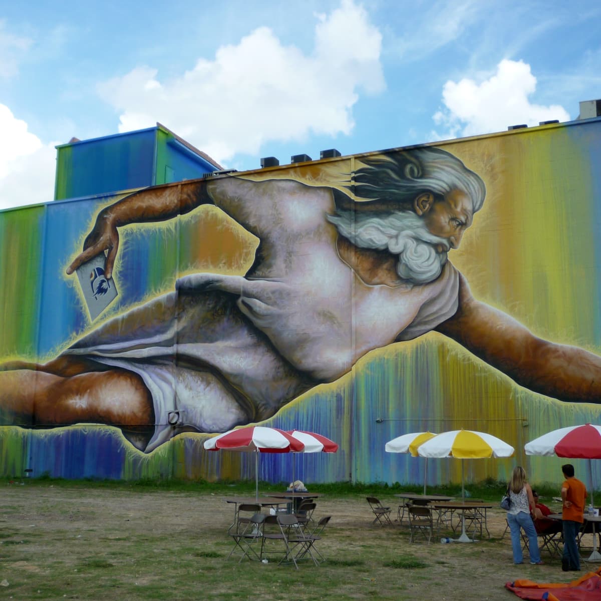 New Mural Pays Homage To Space City With Cosmic Canine – Houston