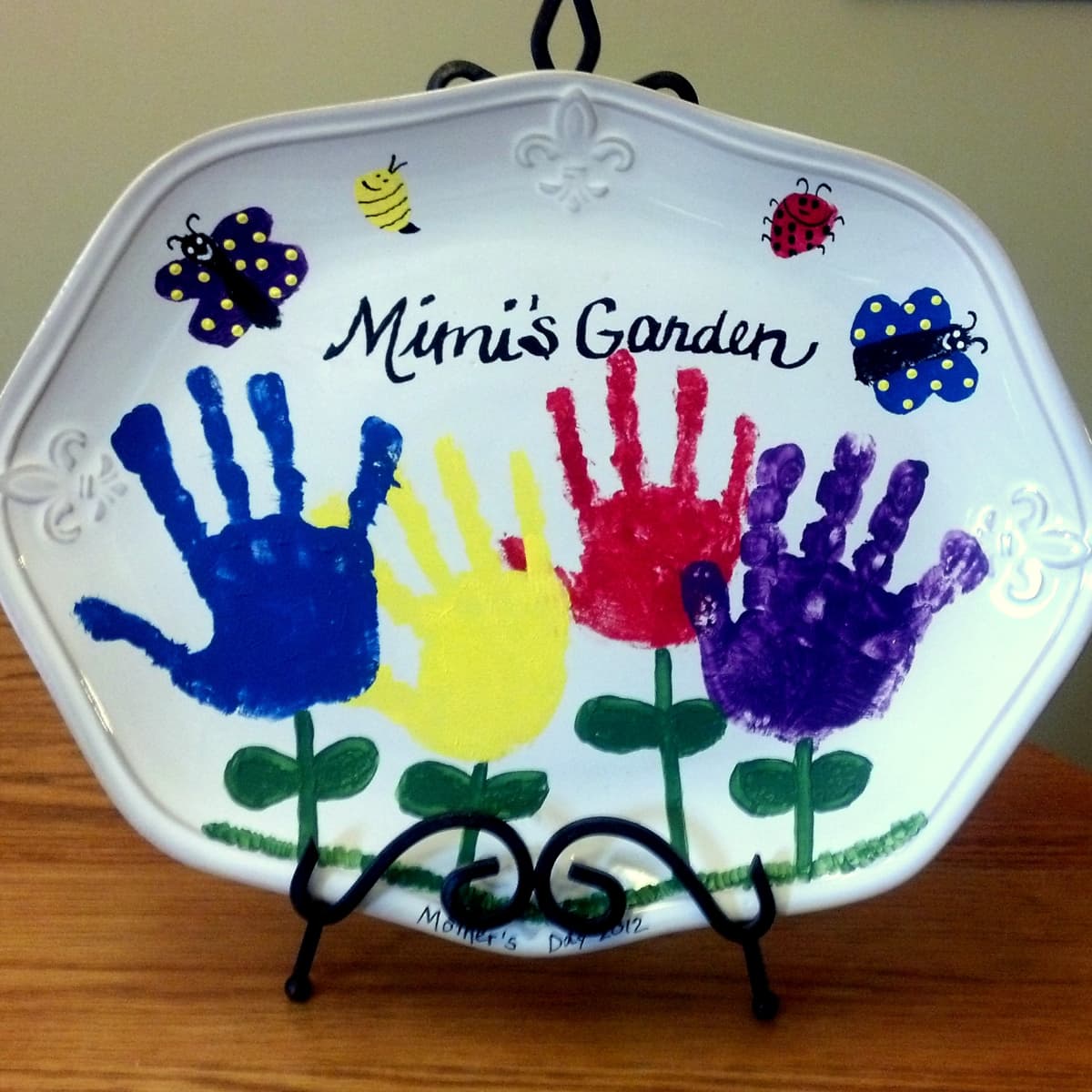 Ceramic Painting for Kids: How to Make a Handprint Plate - FeltMagnet