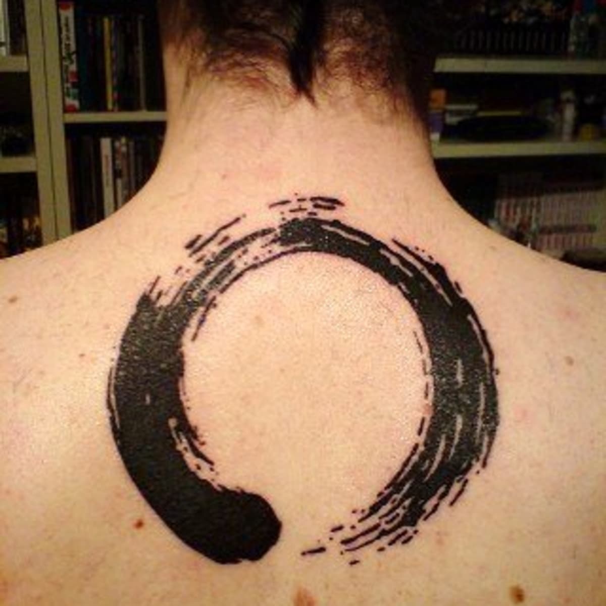 Enso tattoo on the thigh