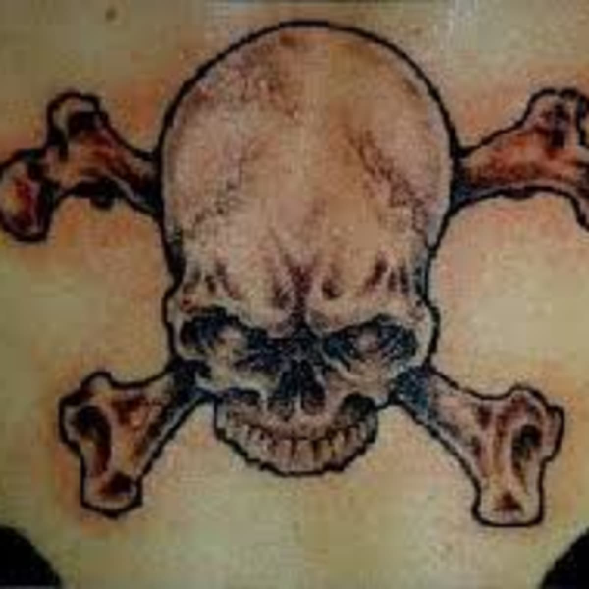 Skull And Cross Bones by Cat Johnson TattooNOW