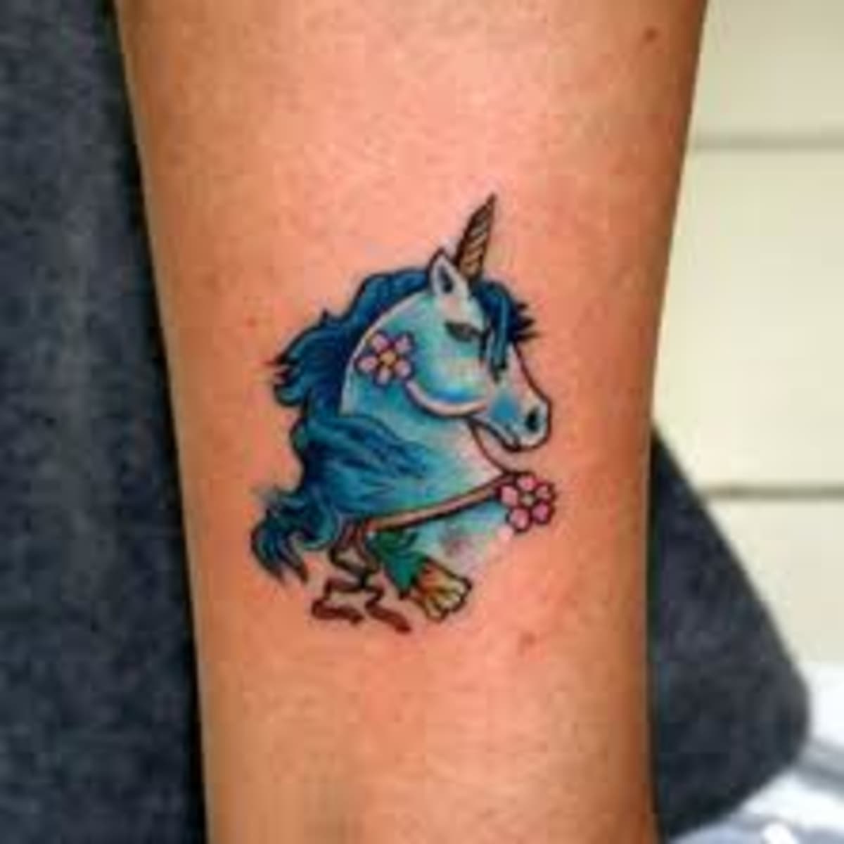 Unicorn tattoo symbol Royalty Free Vector Image