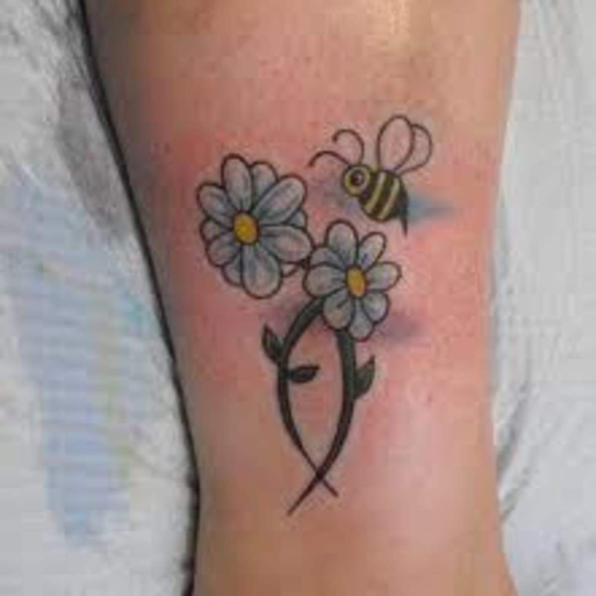 Daisy Tattoo Designs And Daisy Tattoo Meanings-Daisy Tattoo Ideas And Tattoo  Pictures - HubPages
