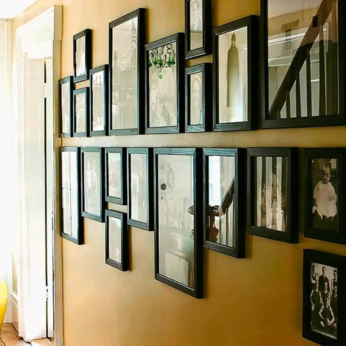 How To Display Framed Photographs On A Wall Dengarden Home And Garden