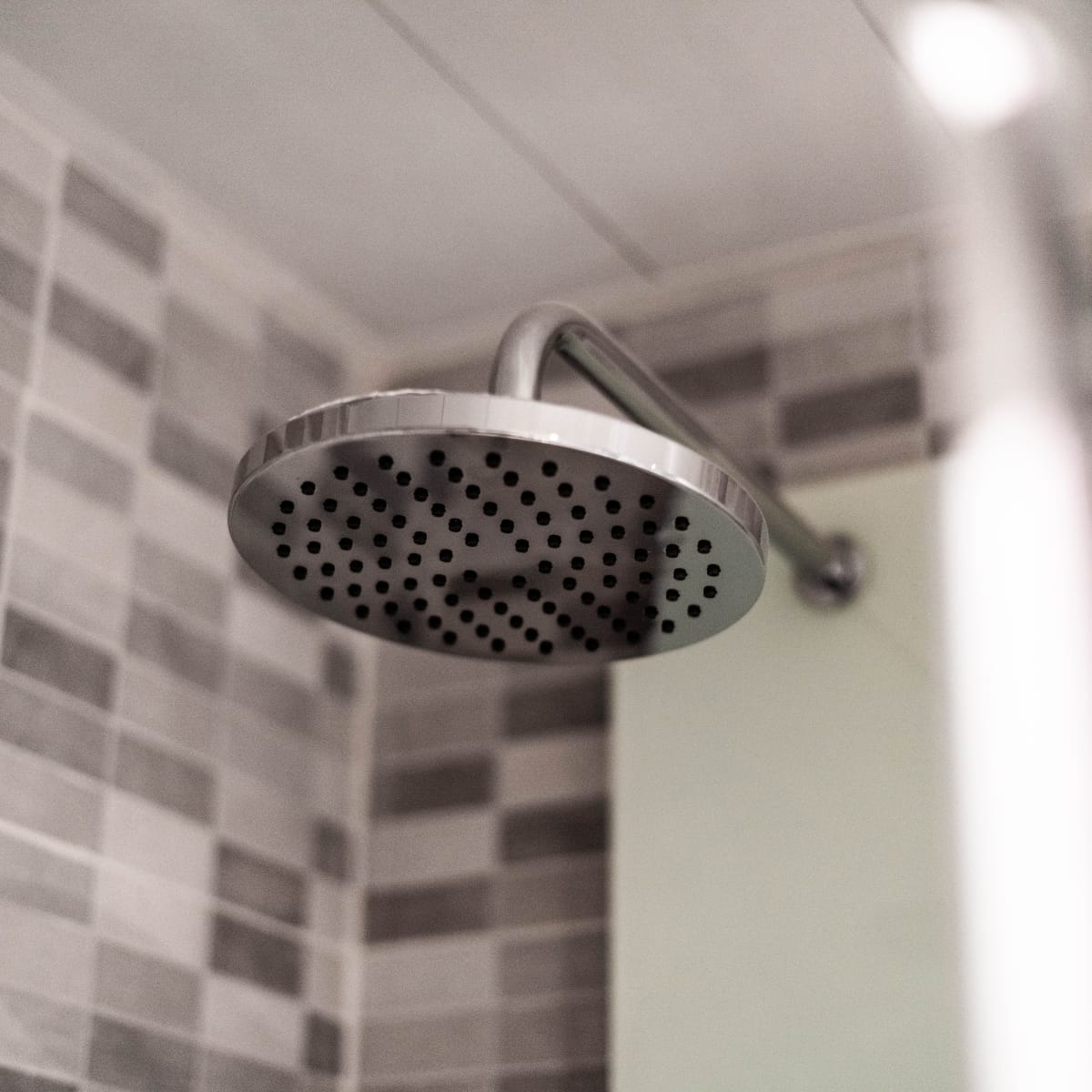 Is Your Shower Drain Clogged with Hair? Here's What to Do