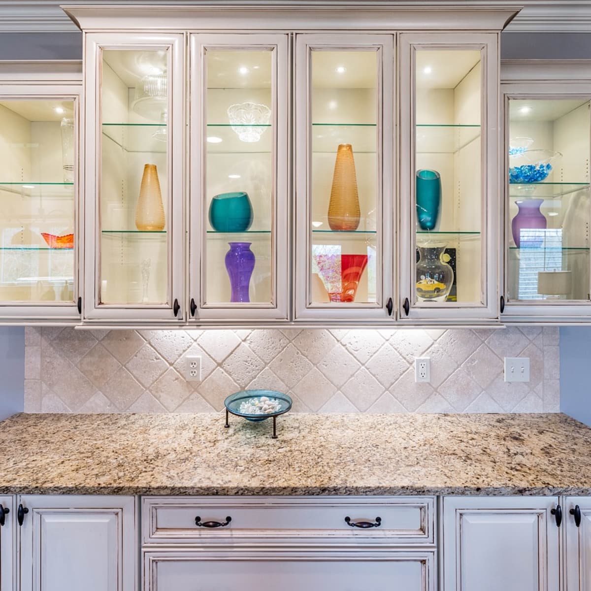 How to Decorate the Top of Your Kitchen Cabinets