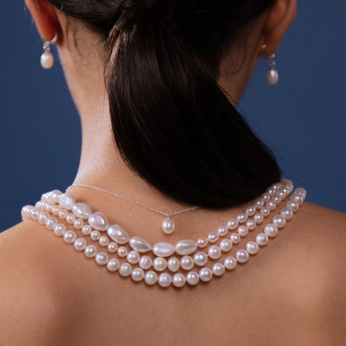 White pearls real vs fake. How to spot fake pearl necklace 