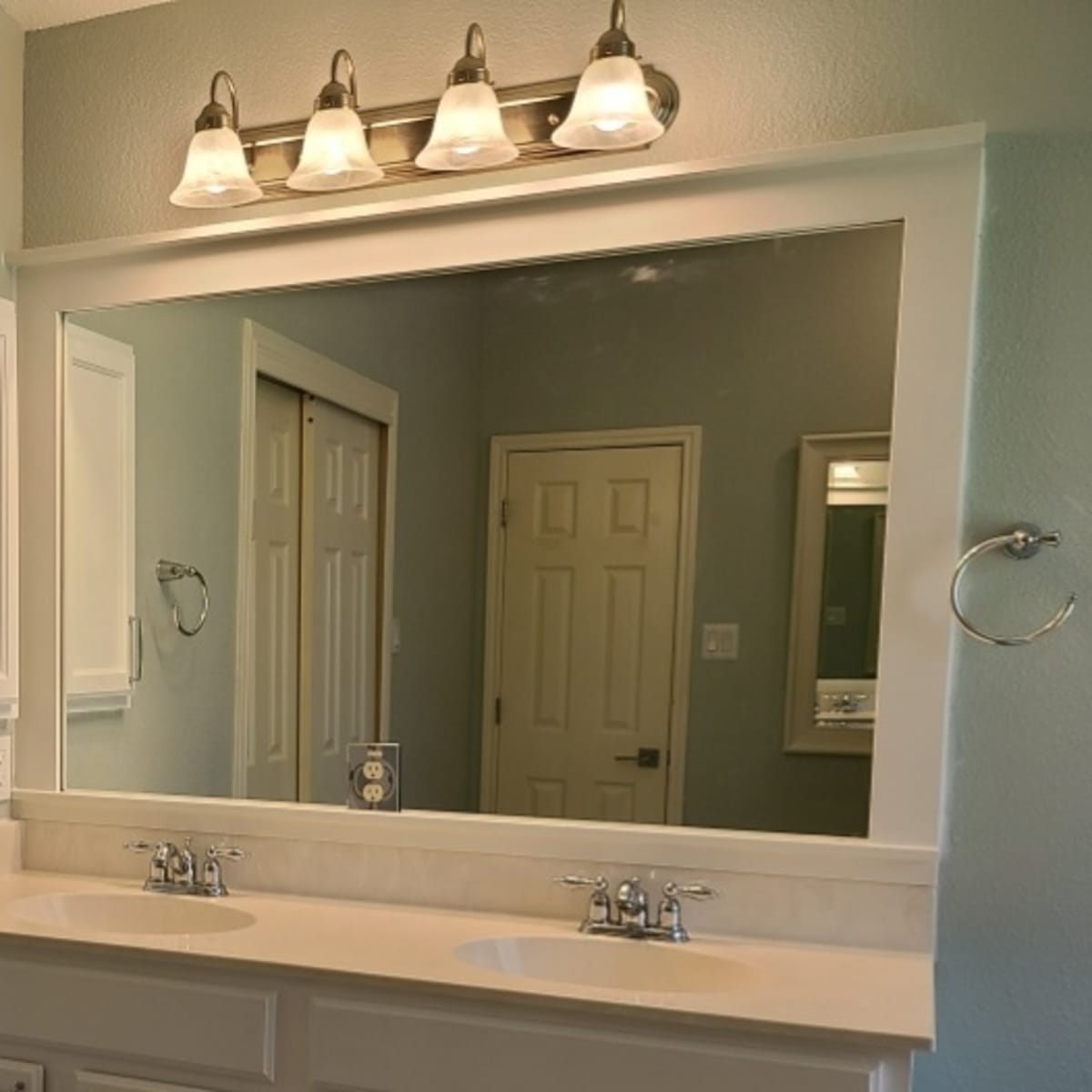 how to frame a builder-grade bathroom mirror the easy way - dengarden