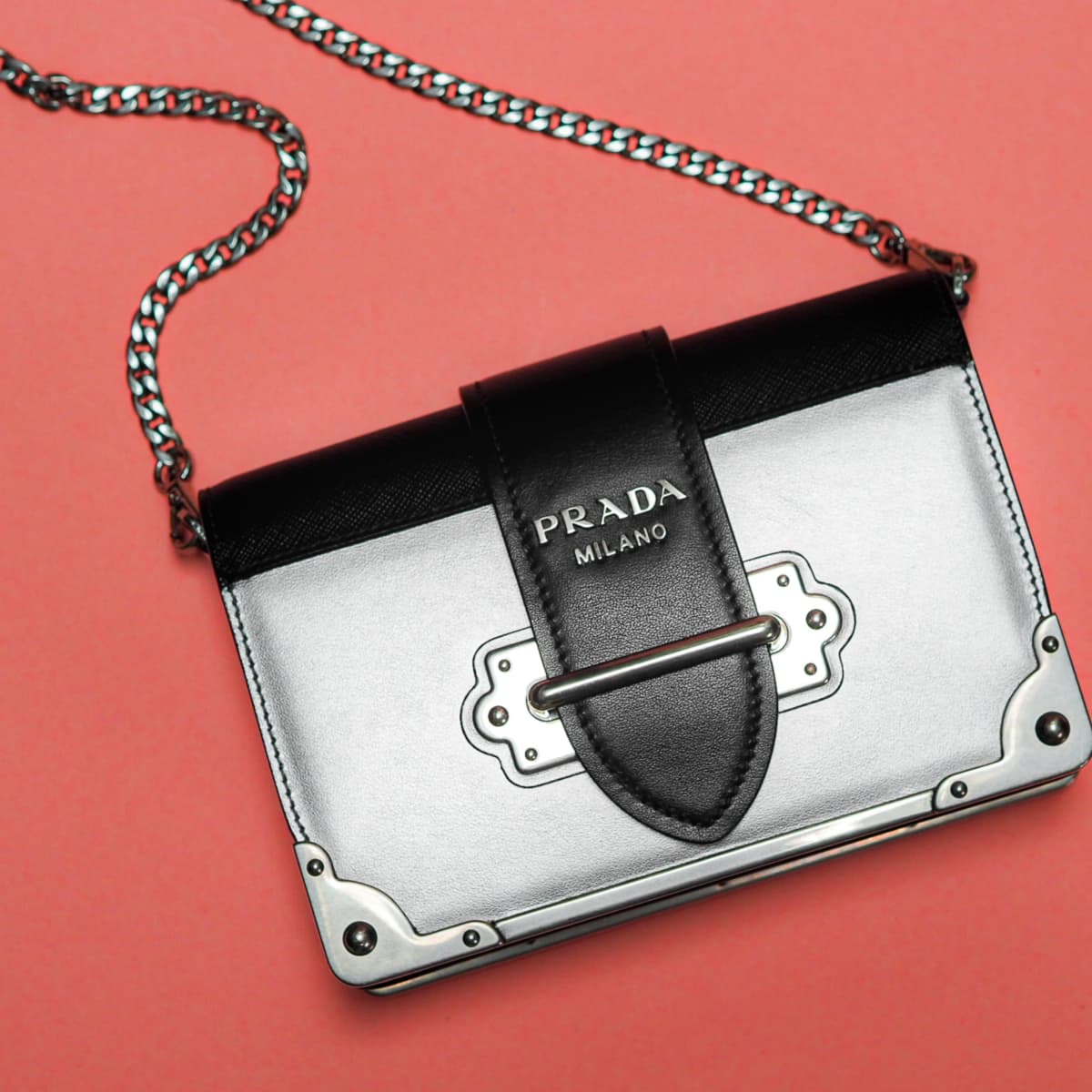 Prada purse with serial numbers below in descri