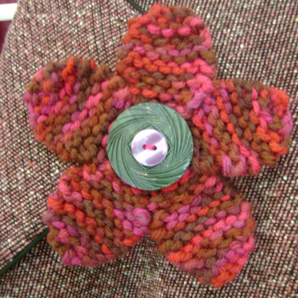 Free Pattern: Flirty Knitted Flower Pin With Button Center