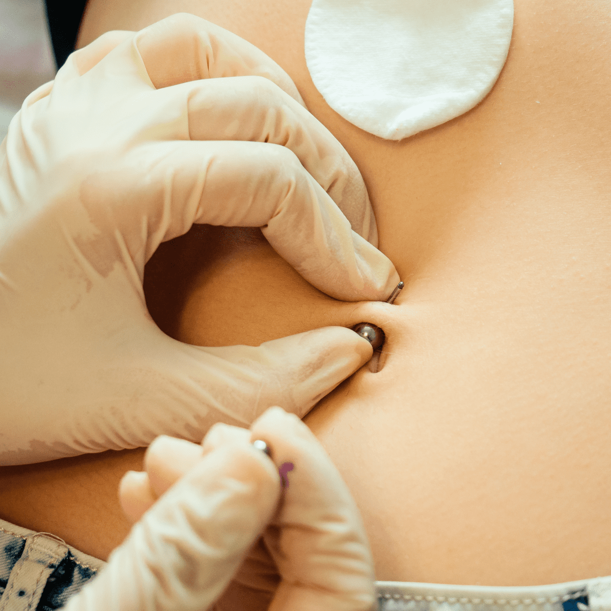 Signs of belly on sale button piercing infection