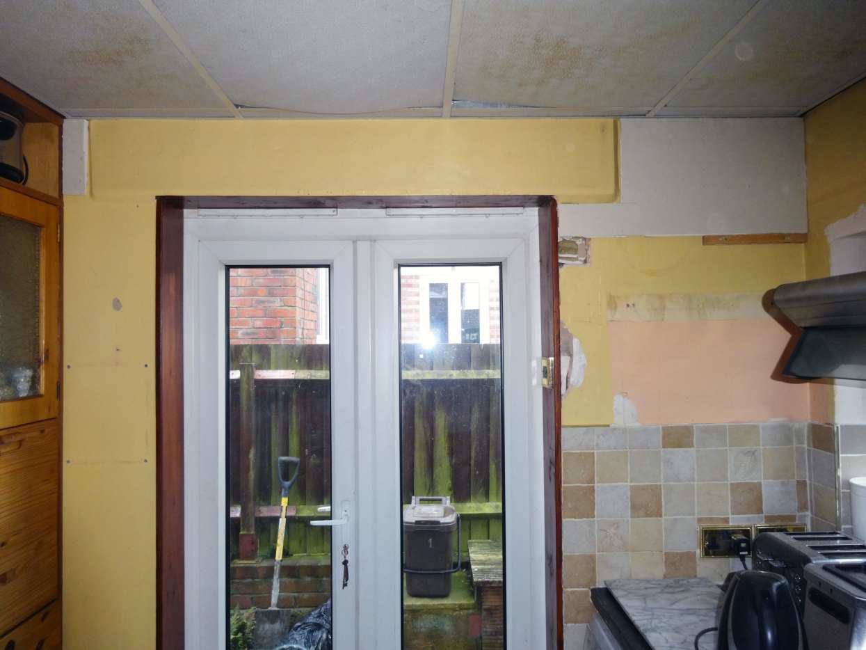 Kitchen Makeover Removing Brick Doorstep and Modifying Wall by the