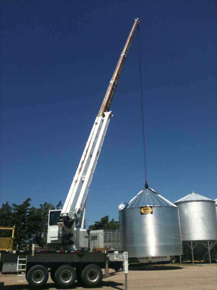 Crane vs. Boom Truck Pros and Cons for Building or Tearing Down a