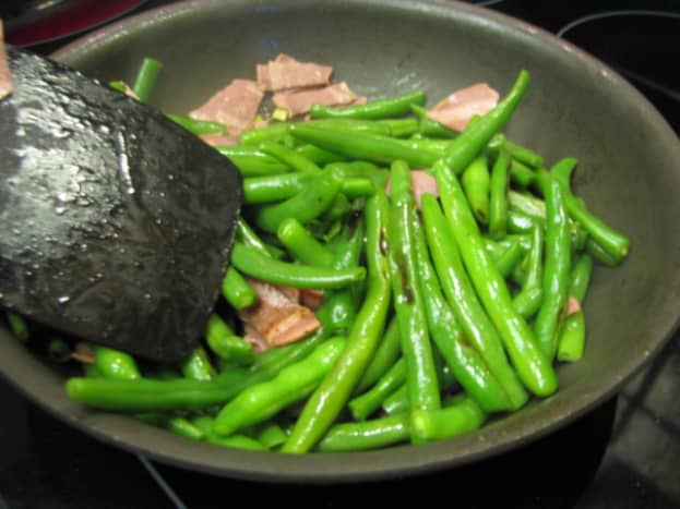 Stir Green Beans and Bacon.