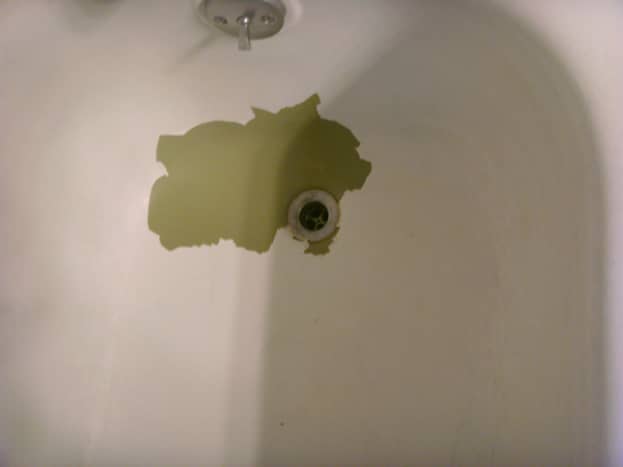 Large chipped area in tub.