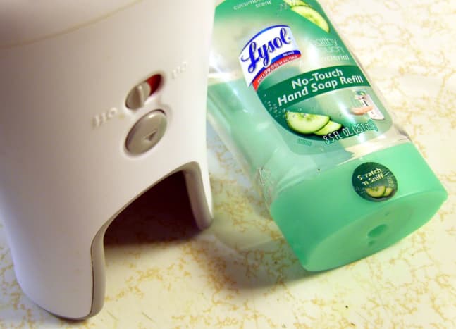 First, turn the automatic soap dispenser off and use the eject button to remove the soap container. The unit can be stood upside down for cleaning.