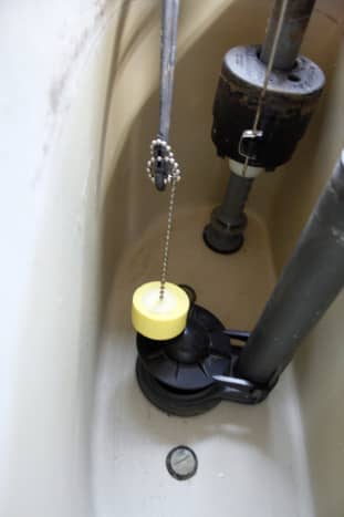 An example of a tangled chain keeping the valve from sealing, thus letting the water continuously run.