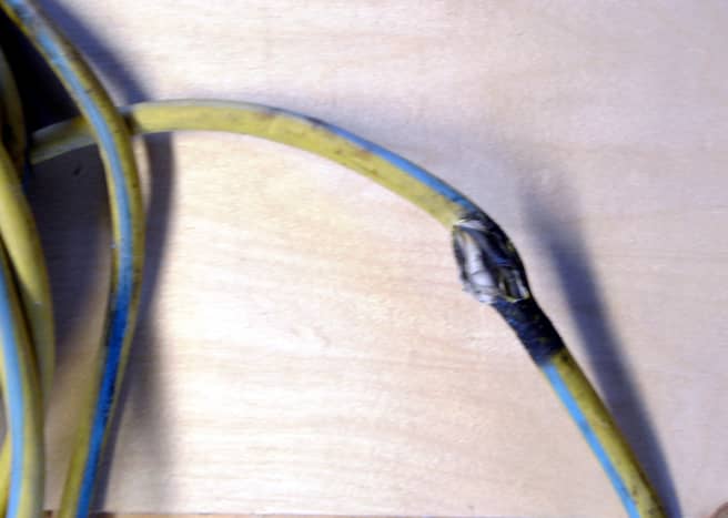 A damaged extension cord.  Either replace or repair properly - never simply throw some tape on it.  