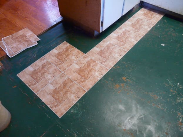 Lay L And Stick Vinyl Tile Flooring, Can You Put Self Adhesive Vinyl Tile On Concrete