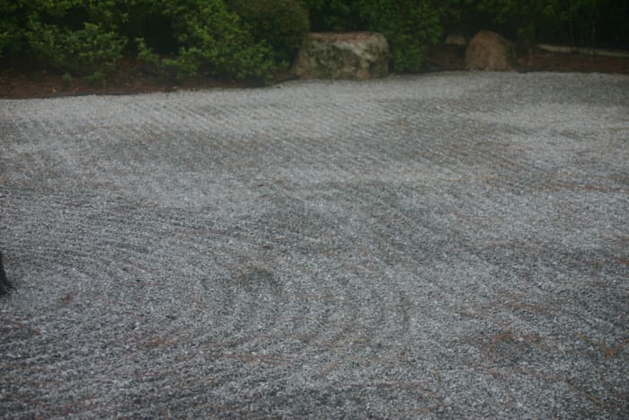 This close-up of the raked gravel gives a feeling of the space of the Zen garden.