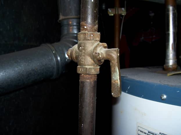 This valve is on. When the handle is sideways to the line, it is off. 