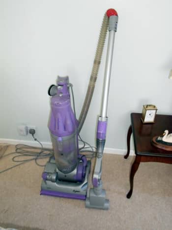 This is my old Dyson, still going strong, despite being mended in a few places and used daily to remove the hair my Jack Russells shed - you would think they would be bald by now!