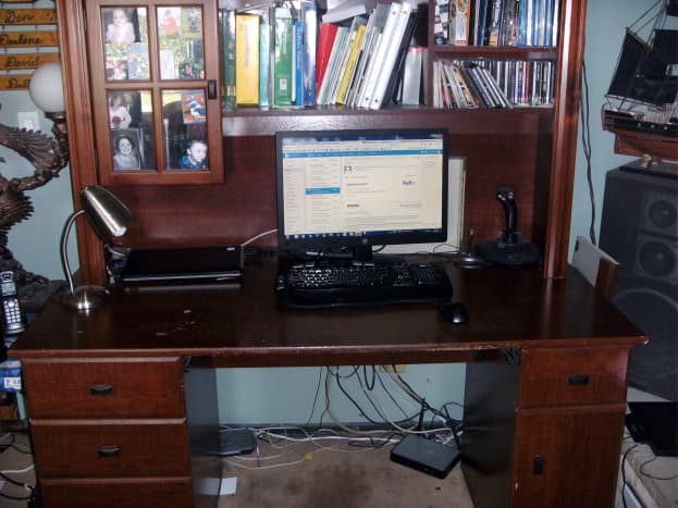 The desk, prior to refinishing. The included shelving above was one reason to keep it, but it did need to be removed temporarily.