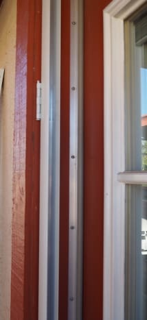 The hinge panel is removable from the door, for choosing which side you want it to swing