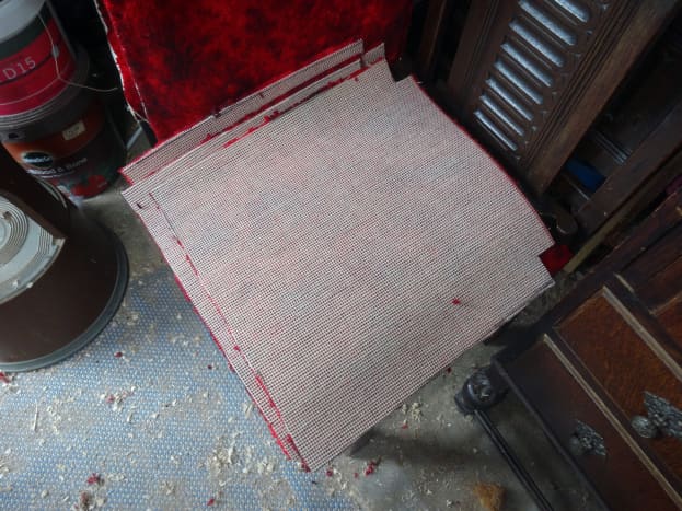 Squares cut from the Axminster carpet off cuts, ready for use; upside down and showing the weft and warps on the underside.