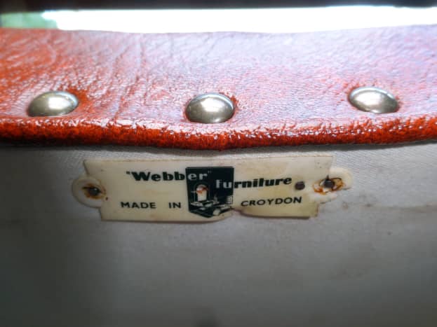 Manufacturer&rsquo;s label reaffixed to the underside of the chair&rsquo;s seat.