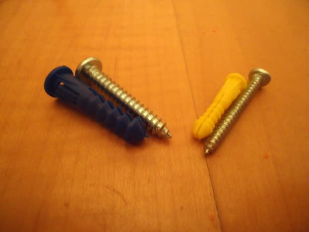wall anchors -- yellow is for light weight and blue is medium to heavy