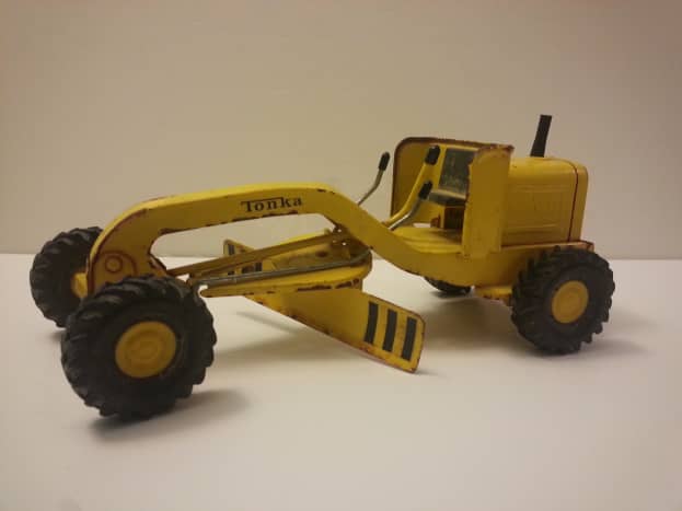 1964 Tonka mini-grader. Tonka also released 'mini' toys in the early 2000s, but those are truly minis&mdash;around 3&ndash;4 inches long. The 1964 version is almost a foot long.