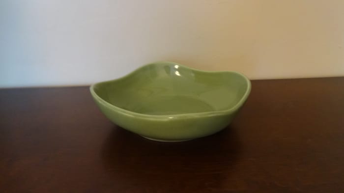 This is a Hall China candy dish. 