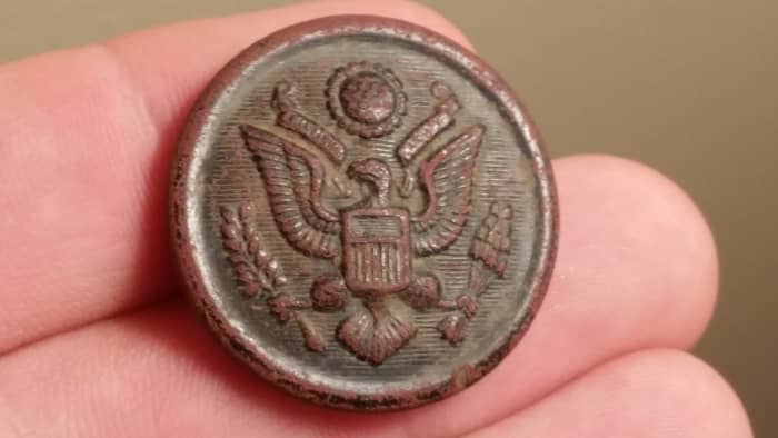 A Great Seal military button I found in my yard with my metal detector.