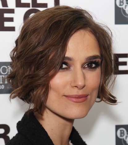 The cut appears to be at the jawline as stated not to do, however the soft curls in her hair balance it out making it a beautiful style for her face.