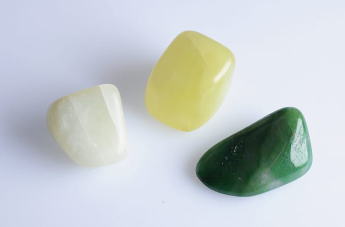 These three stones are all jade, even though only one has the green hue we normally think of for this ornamental stone.