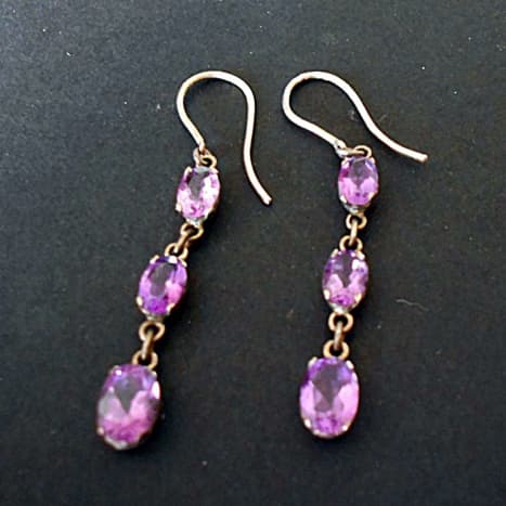 Tarnished silver and amethyst earrings before cleaning.