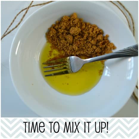Mix the brown sugar and olive oil thoroughly with a fork or spoon.