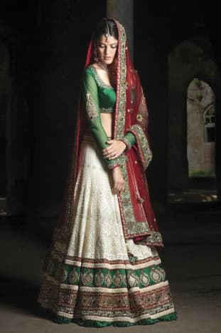 This is an A-cut lehenga skirt in off-white, green and red. 