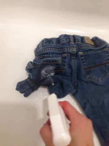 I sprayed front and back of one side of my jeans.  I forgot my gloves!  Don't be like me!
