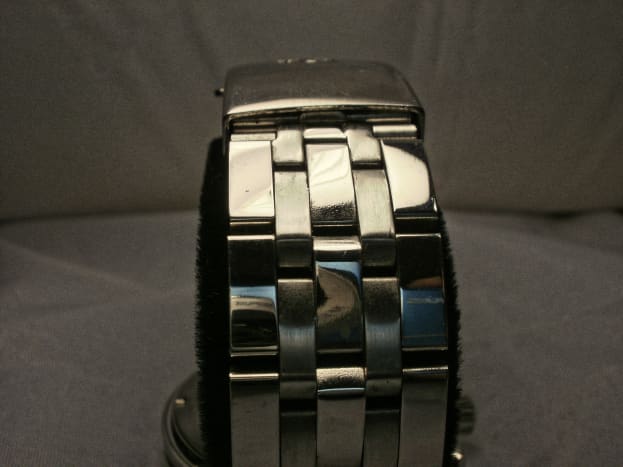 This replica watch is equipped with a stainless-steel strap.