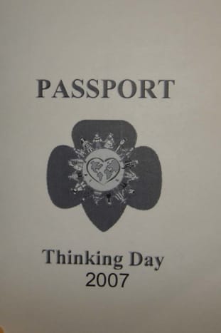 A simple passport, printed on 8x5 x 11 plain paper, folded in half. Inside, a grid for passport stamps.