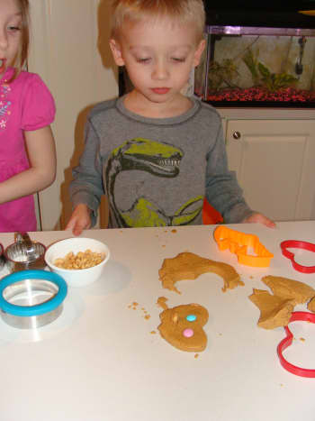 Yummy fun with cutting shapes out of the edible playdough.