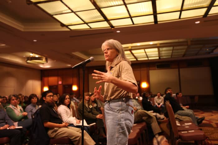 This biologist is rockin' those mom jeans at a pubic town hall meeting where she's addressing the public.  Triple bonus points for not dressing up.  Love this gal!