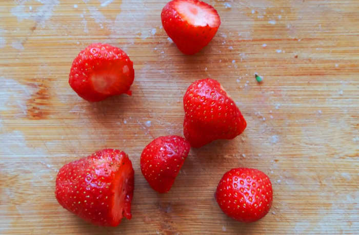 These strawberries need cutting!