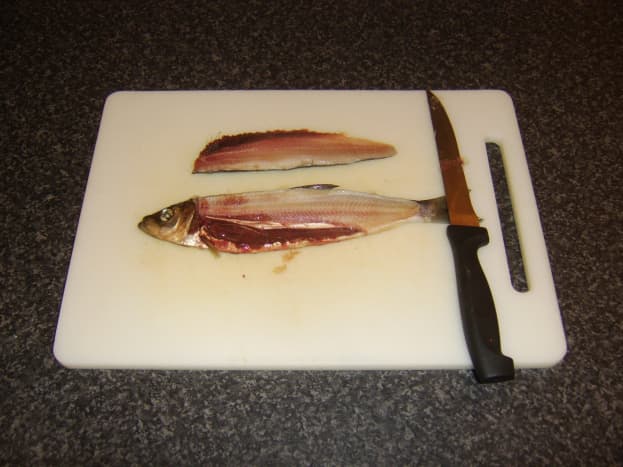 First loin fillet is removed from the herring.