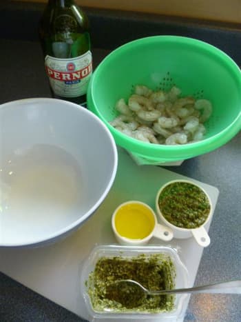 Just a few simple ingredients go into this shrimp recipe: shrimp, olive oil, Pernod and pesto sauce. If you don't have Pernod on hand, try substituting ouzo or even sambuca.