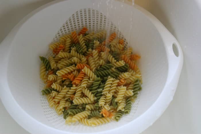Cook and drain the pasta. Rinse under cold water.