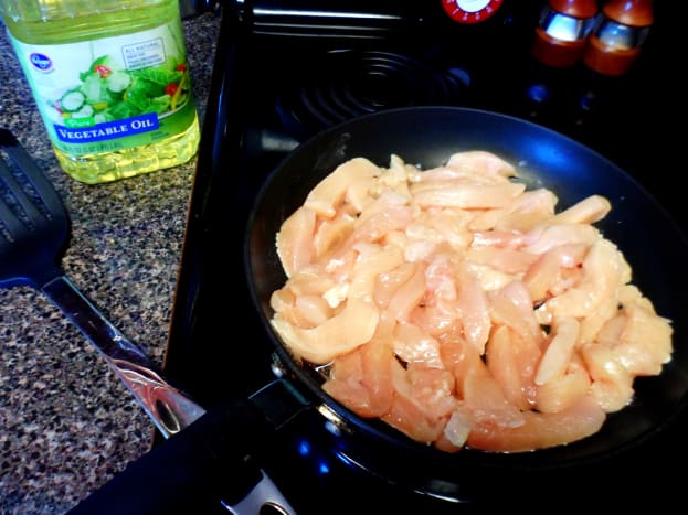 Cook chicken in skillet with 2 tbsp of vegetable oil until juices run clear.